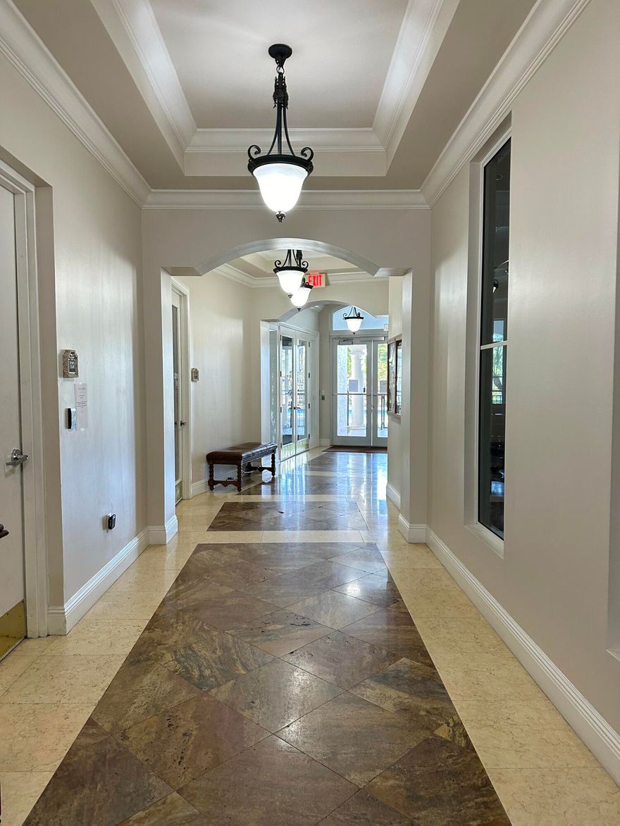 Beautiful 2/2 condo in gated community offers lake views and a desirable split floor plan, granite countertops, stainless steel appliances, impact glass, in-unit laundry, and a covered patio over look a lake. Community has three pools with spas, fitness center, indoor basketball court, billiards, and event room. only minutes from I-95.