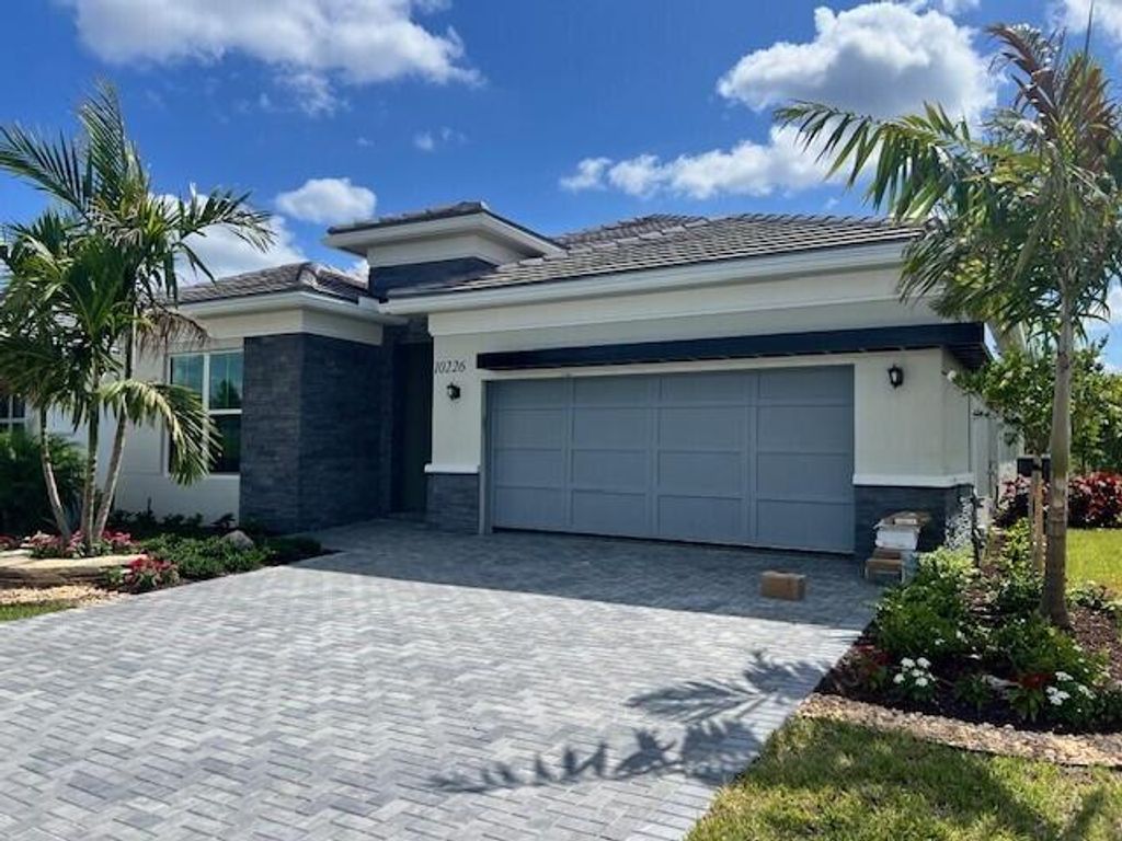 Photo of 10226 Timber Creek Way, Palm Beach Gardens, FL 33412 (MLS # B26024967)