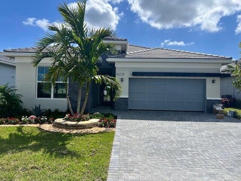 Photo of 10226 Timber Creek Way, Palm Beach Gardens, FL 33412 (MLS # B26024967)