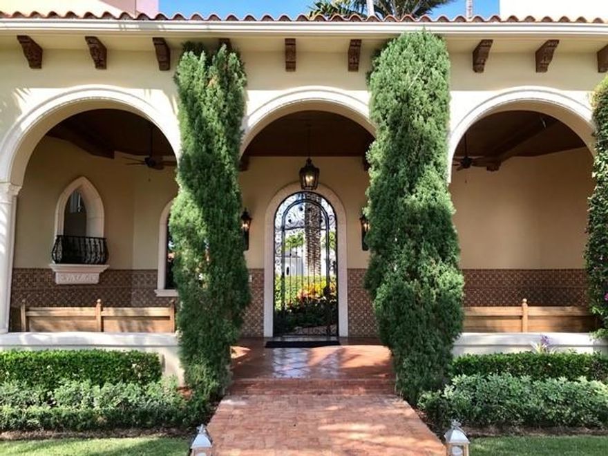 With a multi-million dollar transitional interior remodel, revision & update completed in 2017, this magnificent 19,294 SqFt custom commissioned estate within the exclusive privately guard gated yachtsman's paradise of The Sanctuary in Boca Raton is ideally situated on a trophy double point, cul-de-sac lot claiming 350ft of deep water dockage features twin concrete docks to accommodate 2 mega-yachts, 8 beds, 12 baths & 5 garages. Offering commanding views of the Intracoastal Waterway, this old world European inspired manor sprawls over impeccably manicured landscaped surroundings, resort pool, wet bar, expansive outdoor living room, several covered loggia/entertaining areas & bocce ball court. 2 level 4,111 SqFt standalone Guest House with 2 beds, 3 baths, living room and full chef kitchen