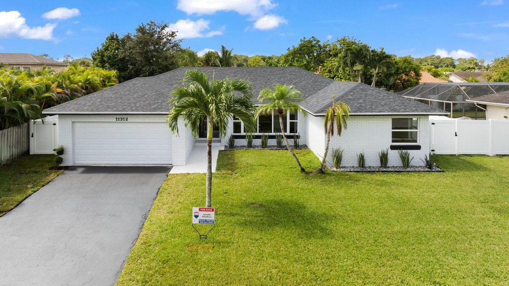 Photo of 11312 Chipmunk Drive, Boca Raton, FL 33428 (MLS # R11012476)