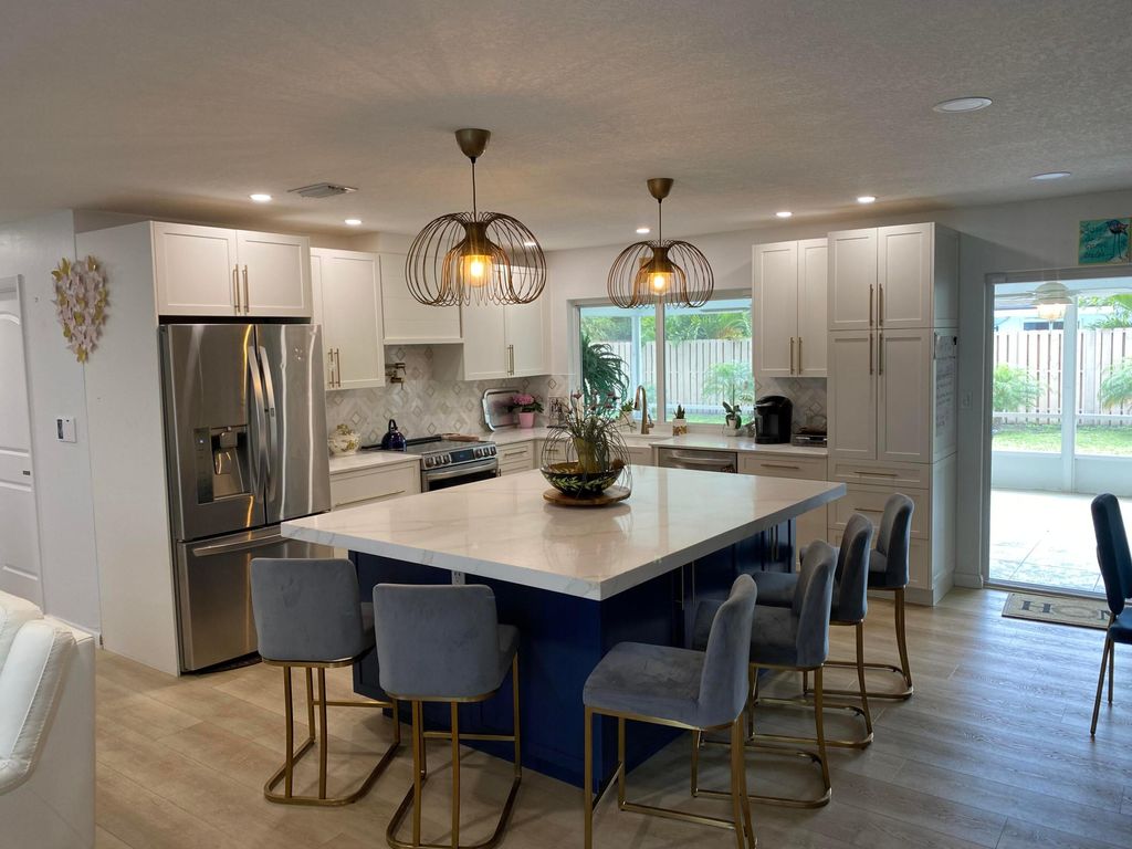 Photo of 1050 NW 6th Terrace, Boca Raton, FL 33486 (MLS # B26014487)