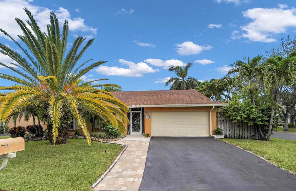 Photo of 9811 NW 53rd Court, Coral Springs, FL 33076 (MLS # B26064113)