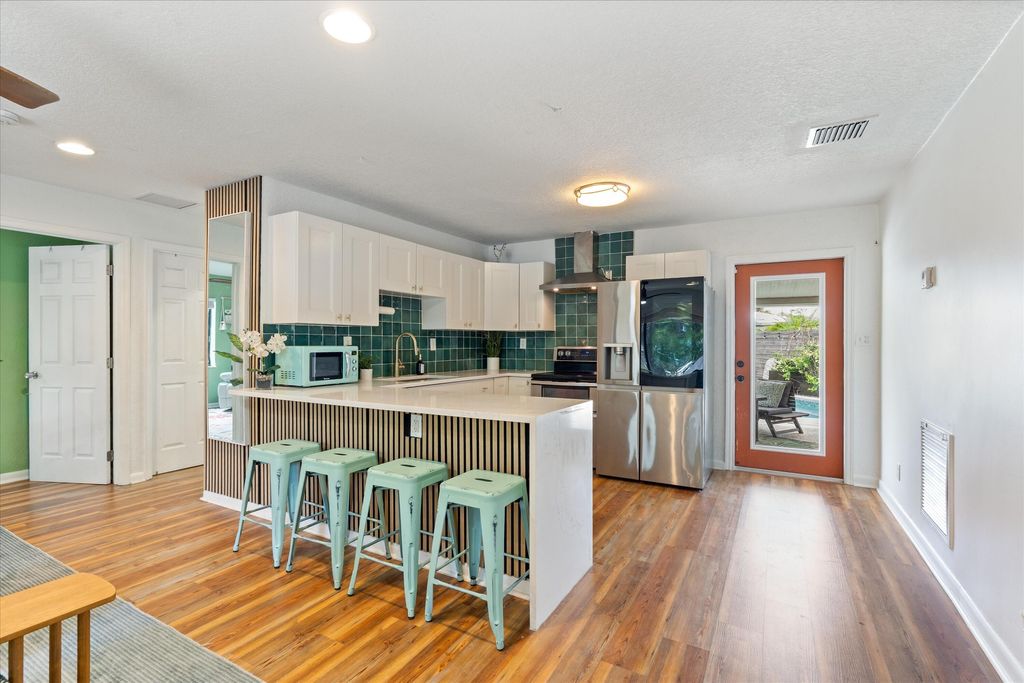 Photo of 2417 NE 13th Terrace, Pompano Beach, FL 33064 (MLS # B26033344)
