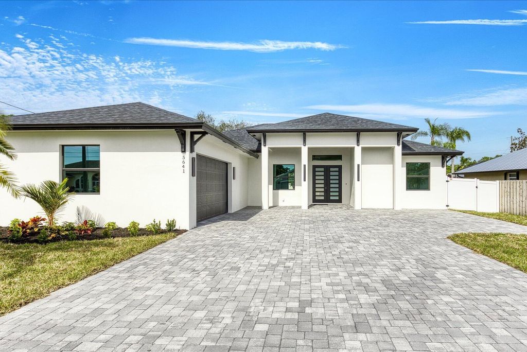 Photo of 5641 NW Crocus Avenue, Port Saint Lucie, FL 34986 (MLS # R11063860)