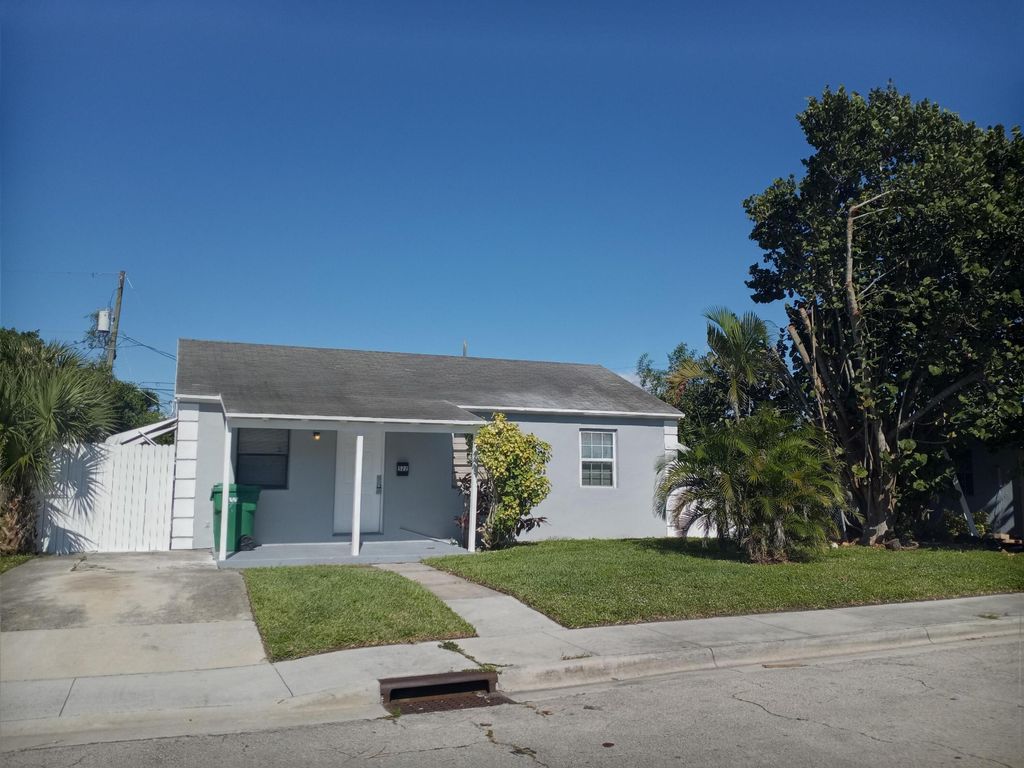 Photo of 522 W 3rd Street, Riviera Beach, FL 33404 (MLS # R11167857)