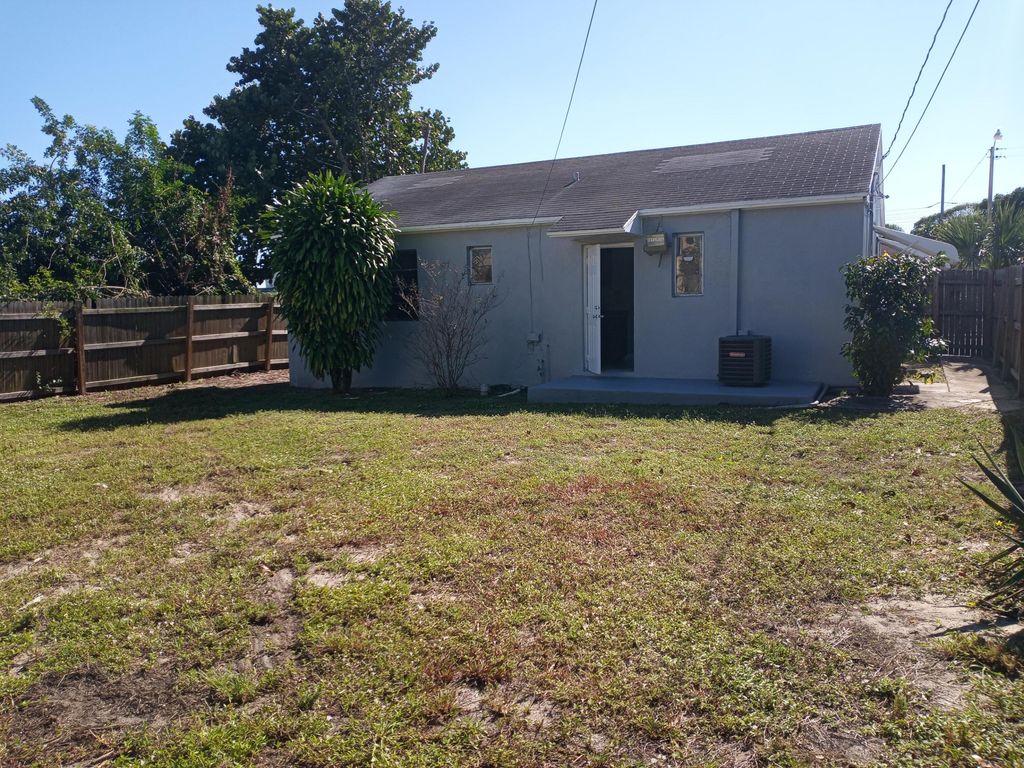 Photo of 522 W 3rd Street, Riviera Beach, FL 33404 (MLS # R11167857)