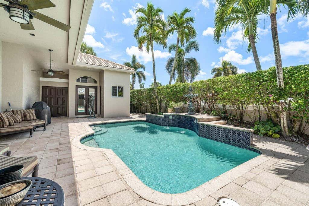Photo of 3299 NW 53rd Circle, Boca Raton, FL 33496 (MLS # B26058754)