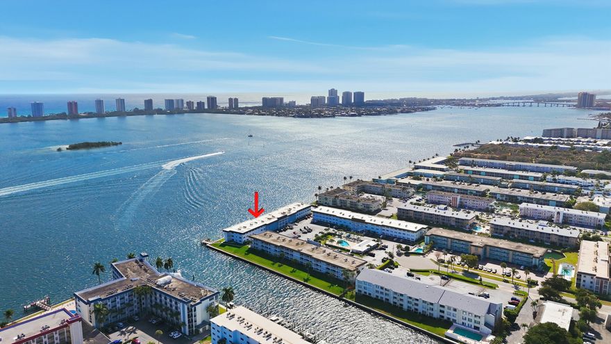 Wake up to million-dollar direct Intracoastal views of the waterway and Singer Island, with breathtaking views of sunsets over the Intracoastal. This well-maintained, move-in-ready co-op offers an open kitchen and great room, impact windows, and laminate flooring. Relax in the fully enclosed screened lanai with constant Intracoastal breezes. Amenities include a beautiful heated salt water community pool and clubhouse with function and exercise rooms, water, insurance building, water and basic cable. This move-in ready unit is situated in desirable locations with convenient access to amenities, beaches, restaurants, shopping, fishing, North Palm Beach Country Club & Golf Course. Live the waterfront lifestyle you've always dreamed of!