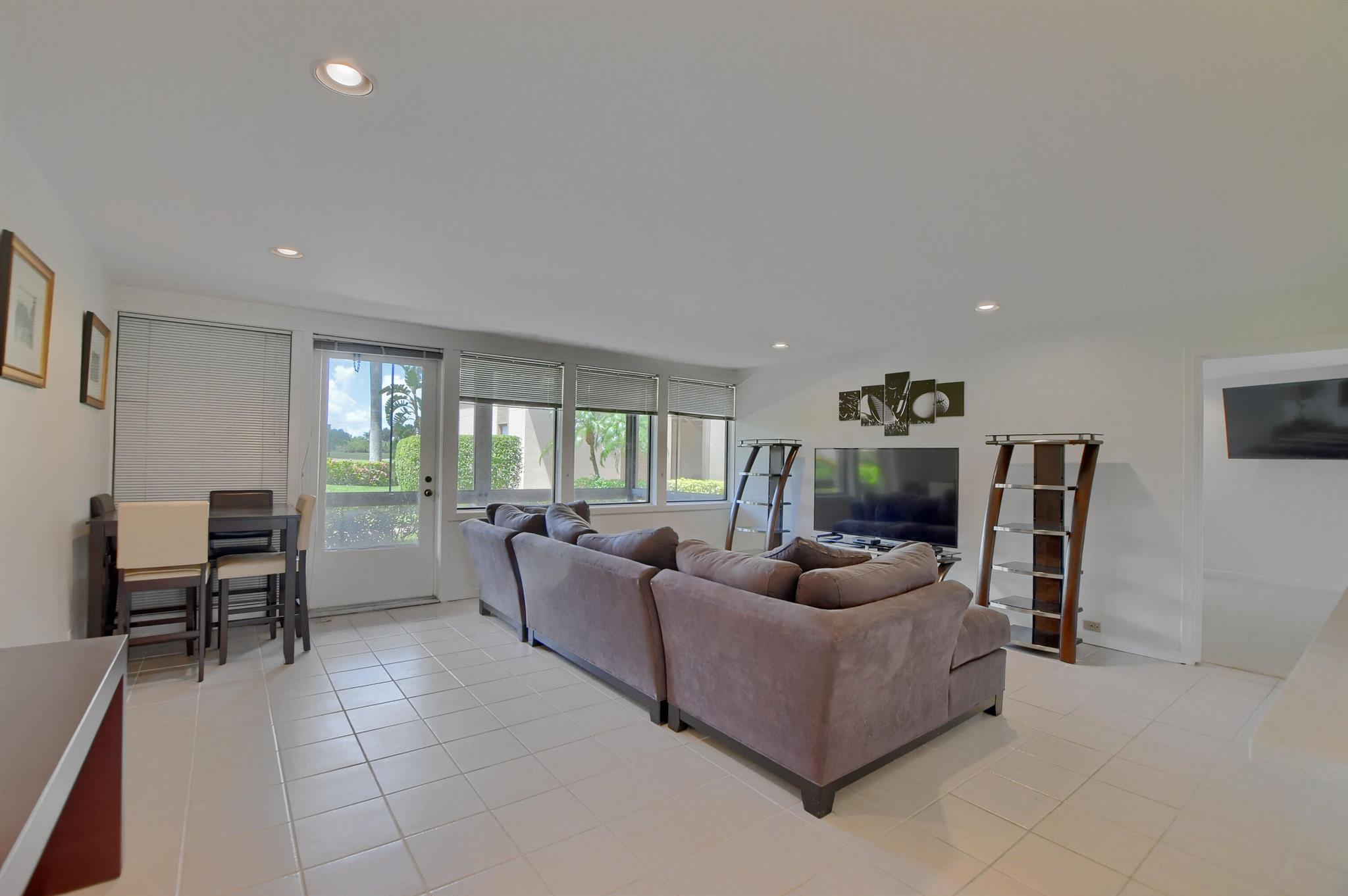 Rarely available first floor Seasonal Rental, with tenant taking membership. FPL is included in rent payment. ~ Imagine life inside the Nation's #1 Private Residential Country Club Lifestyle offering resort-style living. Conveniently located less than 10 minutes from downtown Boca Raton. PLAY our 4 Golf courses, 27 Tennis courts and 14 Pickleball courts; SHOP our retail store, golf and tennis pro shops, DINE in our 10 dining venues. Spend the day RELAXING at our 5-star fitness center, pool, spa and salon. ENJOY endless activities in over 400,000 sq. ft. of exceptional amenities & stellar service. Mandatory Social Dues: $20,394.20. Tenant can upgrade to Golf or Racquet Sports membership!