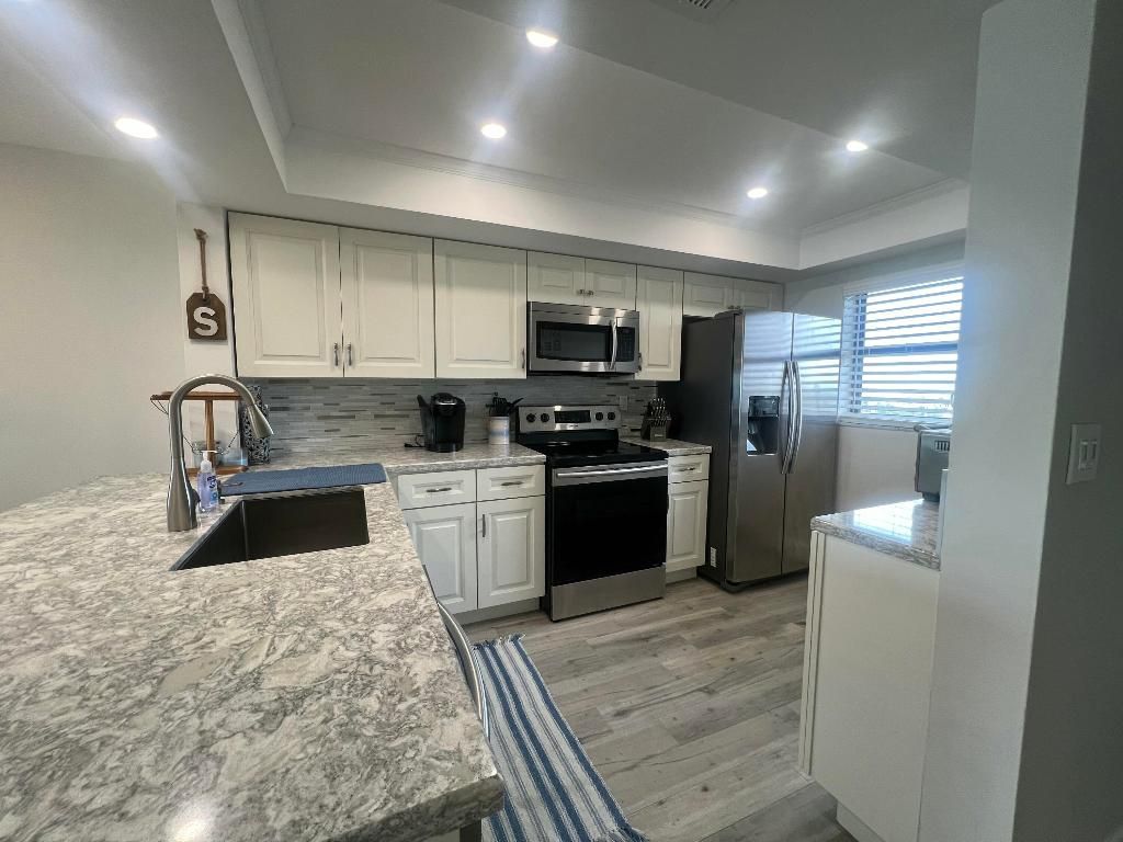 Photo of 10310 S Ocean Drive #608, Jensen Beach, FL 34957 (MLS # R11079763)