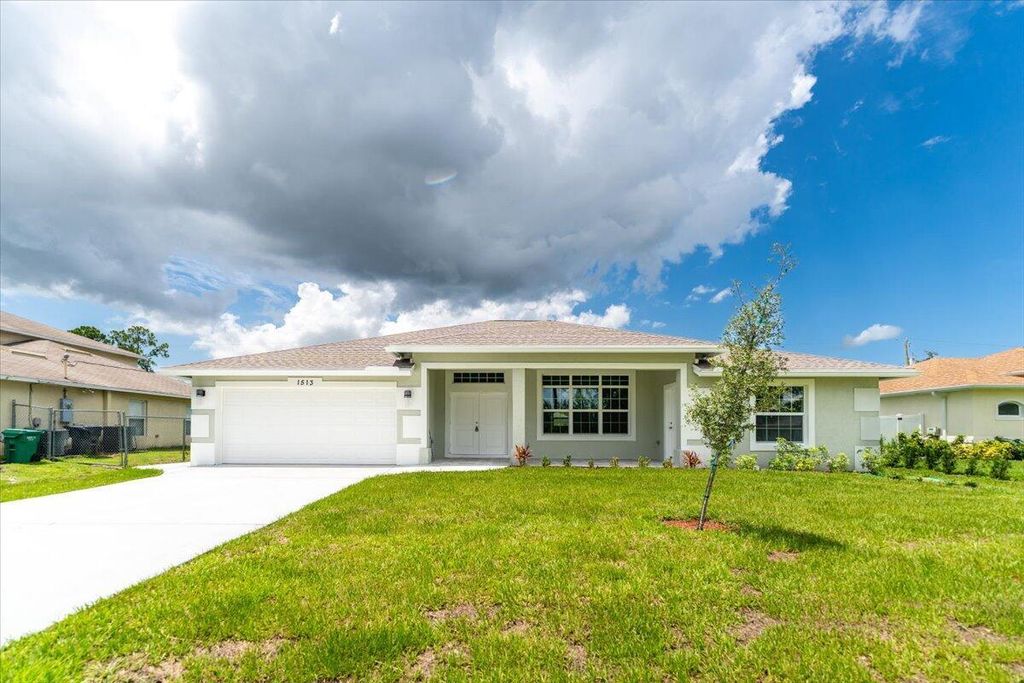 Photo of 1513 SW Santander Avenue, Port St Lucie, FL 34953 (MLS # R10900188)