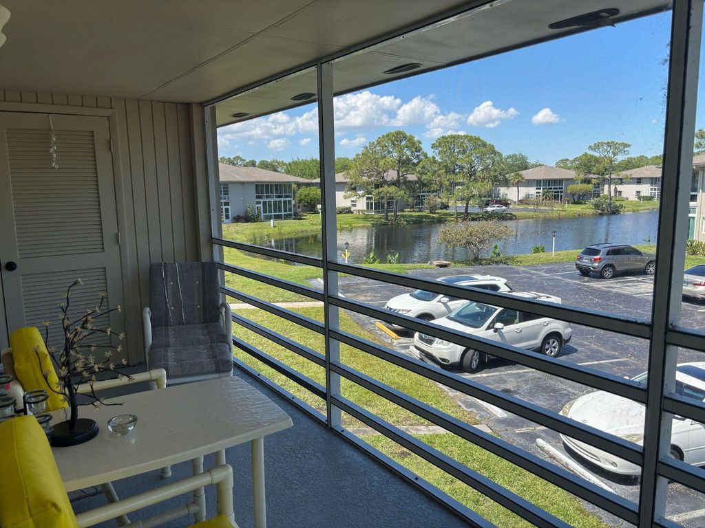 Photo of 7 Lake Vista Trail, Port Saint Lucie, FL 34952 (MLS # B26012424)