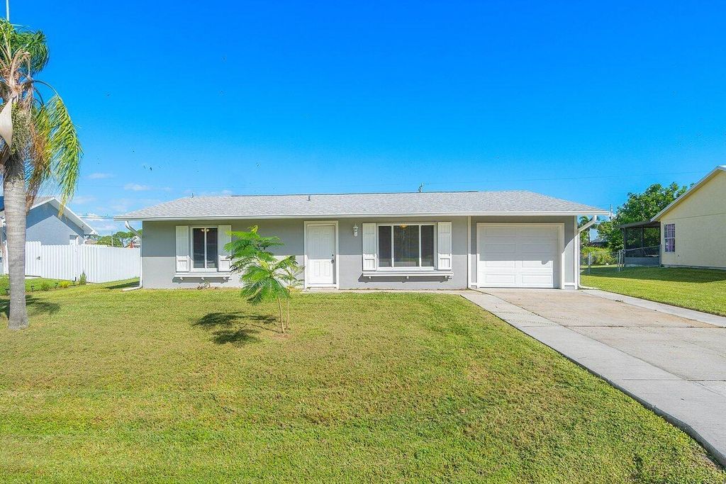 Photo of 325 NW Fairfax Avenue, Port Saint Lucie, FL 34983 (MLS # R10933274)