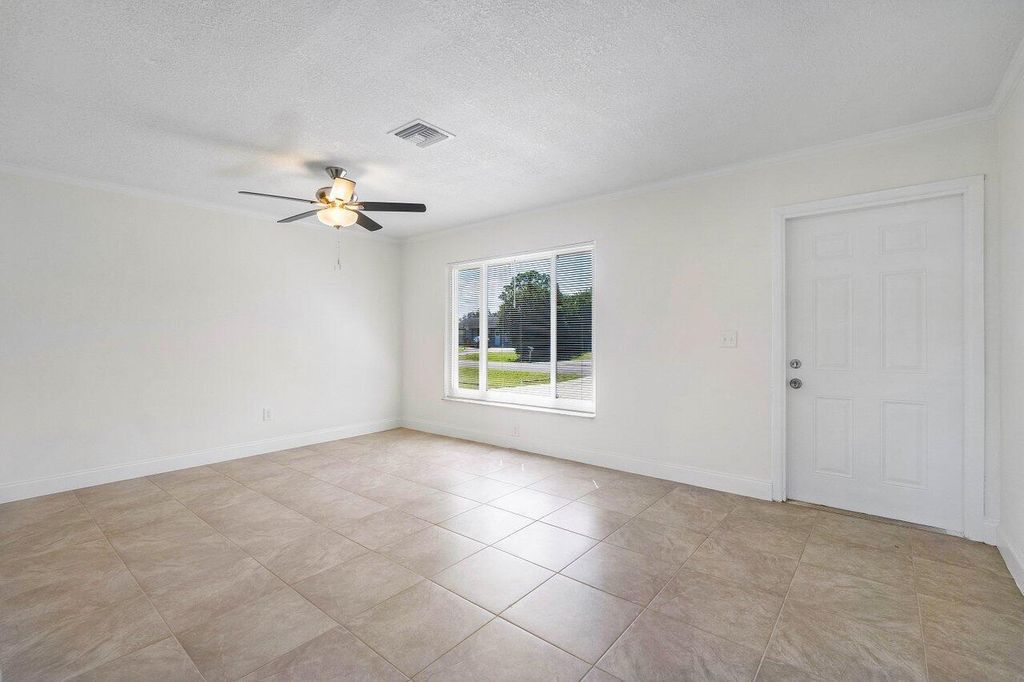 Photo of 325 NW Fairfax Avenue, Port Saint Lucie, FL 34983 (MLS # R10933274)