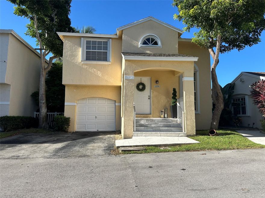 Escape to your private oasis in Pembroke Pines' desirable Pierpointe gated community! This beautifully maintained 3-bed, 2.5-bath home perfectly blends comfort and convenience. Imagine enjoying coffee on your private, decked patio or taking a dip in the community pool just a short stroll away. The spacious, open layout with wood laminate floors is ideal for entertaining, while the freshly renovated bathrooms add a touch of luxury. With recent upgrades including new appliances and a smart thermostat, this home is truly move in ready. Experience resort-style living with access to a pool with jacuzzi, and serene lake views within a short walking distance. Don't miss this piece of paradise