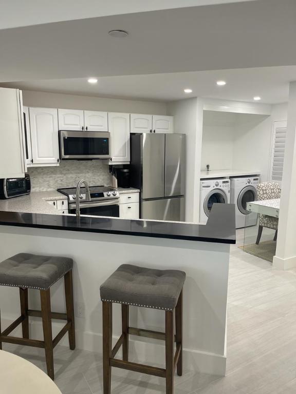 HIBISCUS BY THE SEA CONDOMINIUM - Residential Lease