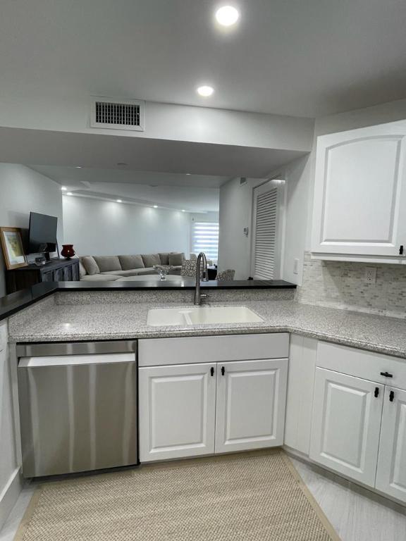 HIBISCUS BY THE SEA CONDOMINIUM - Residential Lease