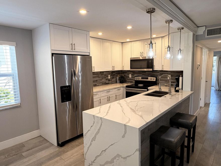 Welcome to elevated 55+ living in Delray Beach. This isn't the condo you settle for — it's the one you've been waiting for. Fully renovated 2-bedroom, 2-bathroom residence offering a modern, move-in ready lifestyle in one of South Florida's most desirable active adult communities. The brand-new kitchen has been completely transformed with contemporary cabinetry, updated fixtures, and clean finishes that make cooking feel less like a chore and more like a vibe. Both bathrooms? Also fully renovated — no dated tile, no half-measures. Just crisp, modern design from top to bottom. The split floor plan keeps things private and functional, while the open living space feels bright, airy, and larger than the square footage suggests. Tasteful. Boldly different. Schedule your showing today!