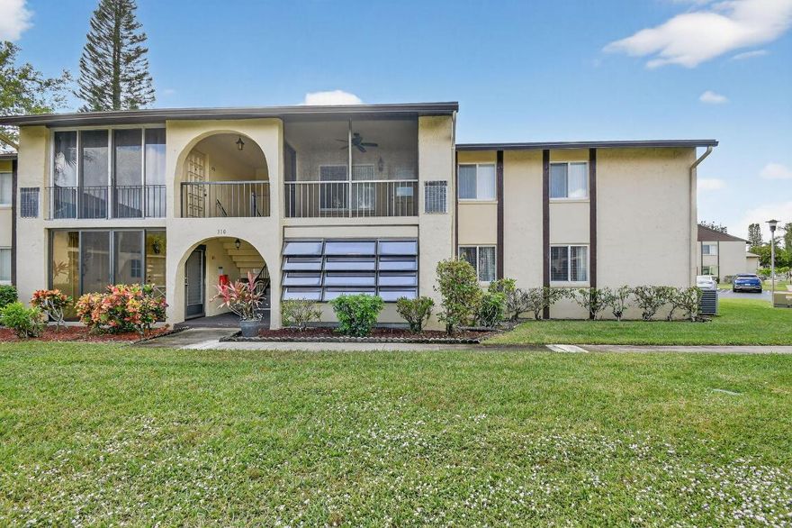 Experience refined South Florida living in this elegantly maintained 2-bedroom, 1.5-bath ground-floor residence located in the beautifully landscaped and highly sought-after Pine Ridge III 55+ community. This inviting home offers an ideal blend of comfort and style, featuring a spacious living and dining area designed for relaxation and entertaining. Enjoy a well-planned kitchen layout, generous natural light, and two comfortably sized bedrooms that provide a peaceful retreat.
Step out to the private screened-in patio, an exceptional outdoor space perfect for morning coffee or unwinding at sunset, surrounded by meticulously kept grounds and a serene community atmosphere. Pine Ridge III offers residents a resort-style lifestyle with amenities including a sparkling community pool, tennis, pickleball, clubhouse, shuffleboard courts, pool tables, walking paths, and social activities. The association provides low-maintenance living with building insurance, cable, exterior maintenance, landscaping, and common area care included.
Ideally positioned near upscale shopping, dining, golf courses, medical facilities, and just a short drive to South Florida's renowned beaches, this residence delivers the convenience, elegance, and tranquility of a premier active adult community. Perfect for seasonal enjoyment or year-round living.