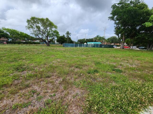 Prime Corner Lot positioned at a bustling intersection. This uniquely shaped parcel offers high visibility and unbeatable access making it a standout opportunity for any buyer to take this parcel through the zoning and variance process with the county. The lot's irregular shape allows for a creative layout that can maximize exposure, whether you're an investor or business owner, it is packed with potential. Don't miss out on this opportunity.