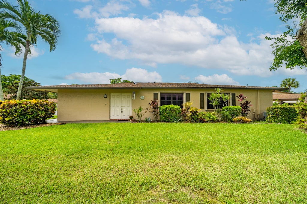 Photo of 1651 Palmland Drive, Boynton Beach, FL 33436 (MLS # B26066750)