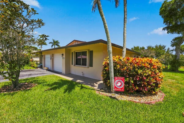 Photo of 1651 Palmland Drive, Boynton Beach, FL 33436 (MLS # B26066750)