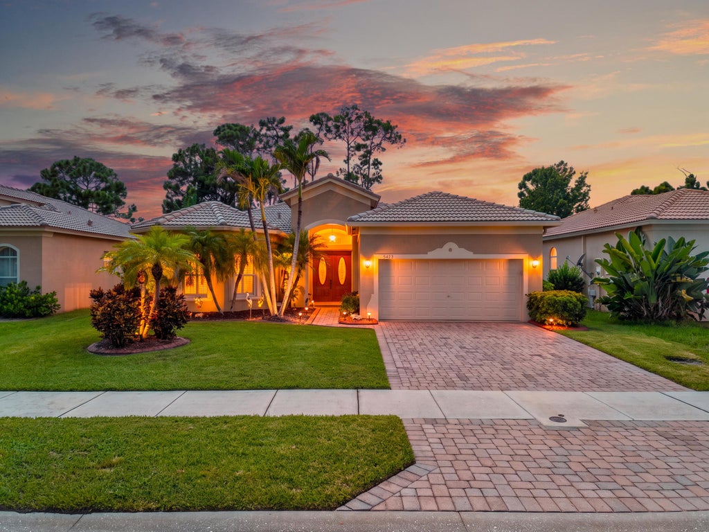 Photo of 5423 PLACE LAKE Drive, Fort Pierce, FL 34951 (MLS # B26069907)