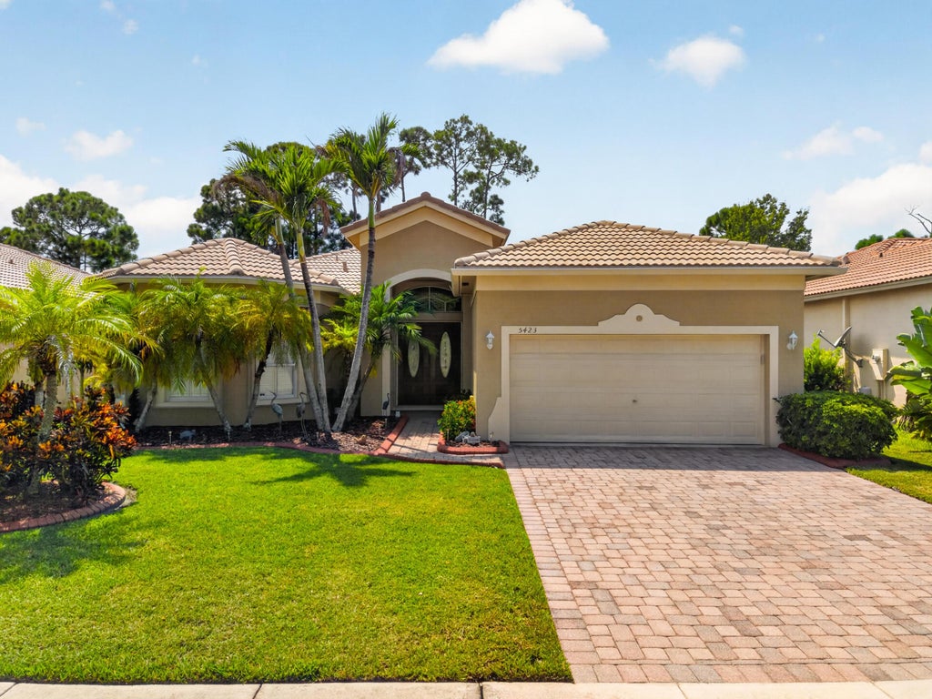 Photo of 5423 PLACE LAKE Drive, Fort Pierce, FL 34951 (MLS # B26069907)
