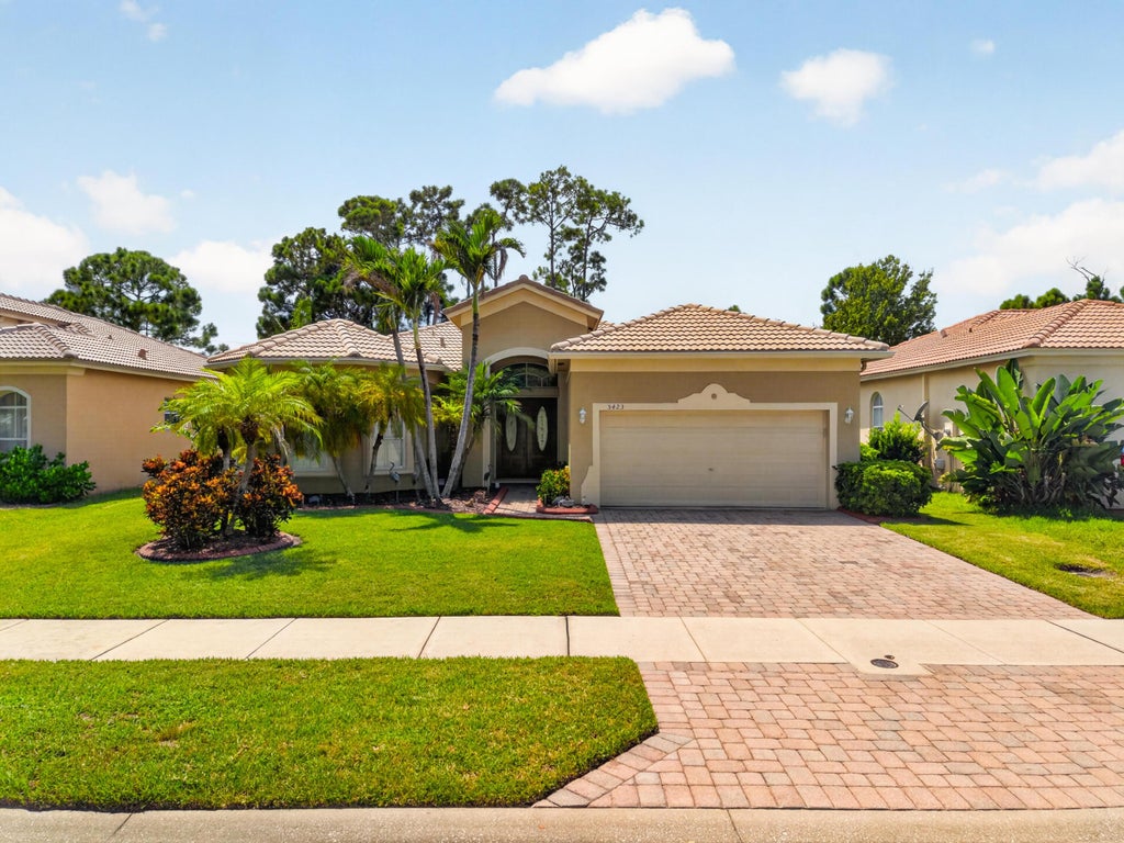 Photo of 5423 PLACE LAKE Drive, Fort Pierce, FL 34951 (MLS # B26069907)