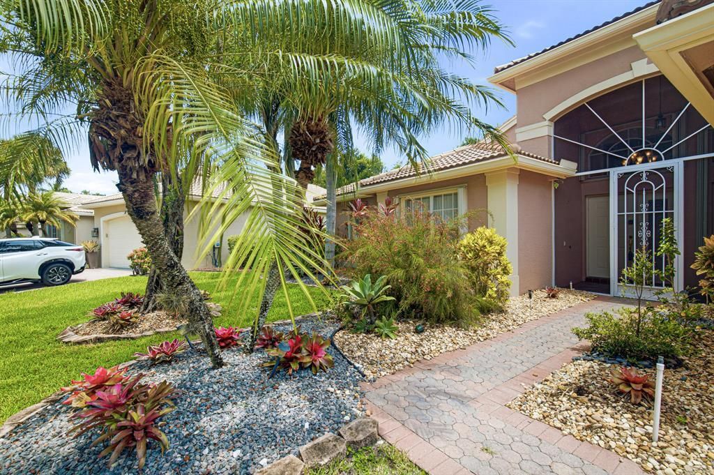 Photo of 7639 Tarpon Cove Circle, Lake Worth, FL 33467 (MLS # B26054548)