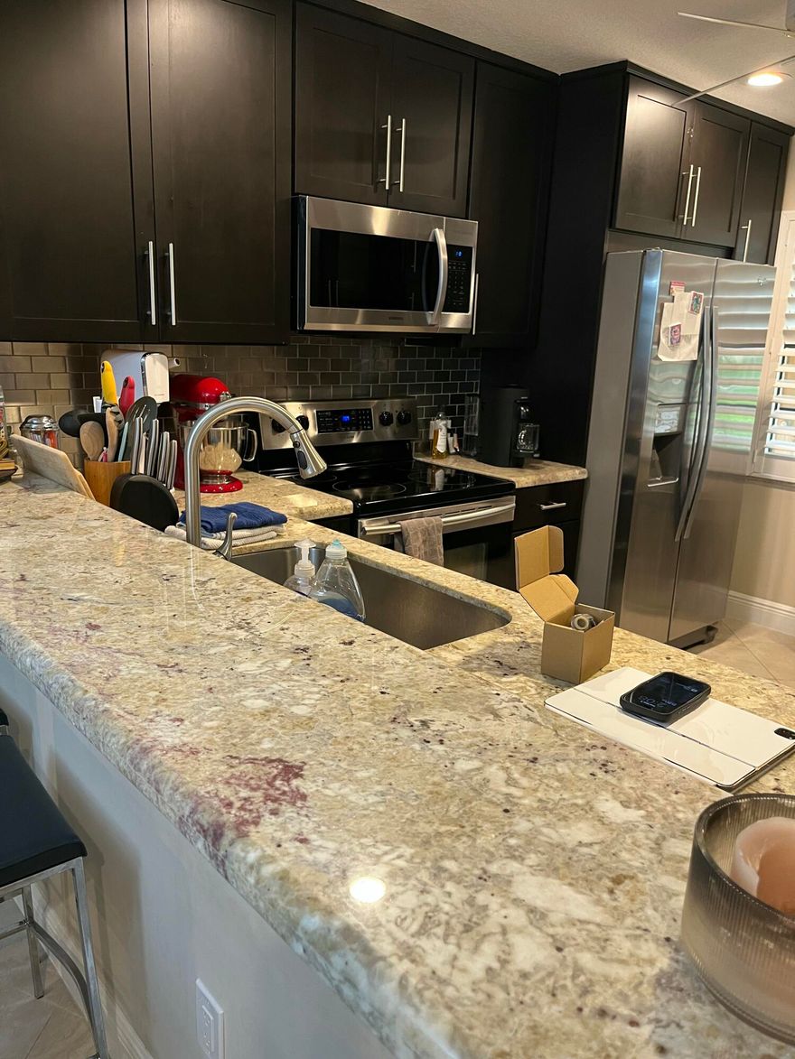 Beautiful first floor rental in Glades at Boca Lago featuring a fully updated kitchen and renovated bathrooms. This one-level unit offers convenience and comfort, with a raised patio floor overlooking stunning golf course views. The spacious primary bedroom includes three closets, providing ample storage throughout the home. A perfect blend of style, functionality, and serene surroundings.
