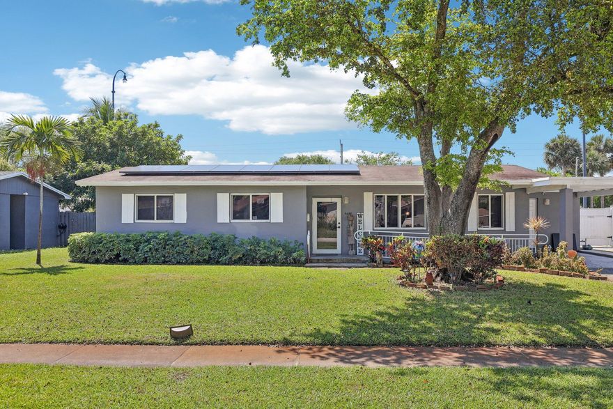 Welcome to this beautifully maintained 4-bedroom home in a highly desirable East Plantation neighborhood. This turnkey residence features a modern kitchen with quartz countertops and stainless steel appliances, along with a 2024 A/C system, 2023 water heater, new electrical and whole-house water softener. Impact windows and doors provide added security and efficiency throughout. The updated primary bathroom adds a touch of luxury, while the spacious screened patio and oversized fenced backyard create the perfect setting for relaxing or entertaining. Equipped with solar panels, this home offers exceptional energy efficiency and remarkably low electric bills. A fantastic opportunity to own a move-in ready home at an incredible value.