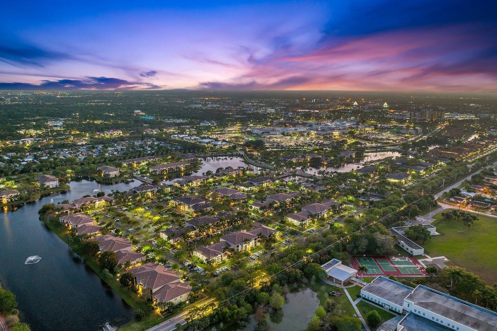 Photo of 3020 Alcazar Place #202, Palm Beach Gardens, FL 33410 (MLS # R11076797)