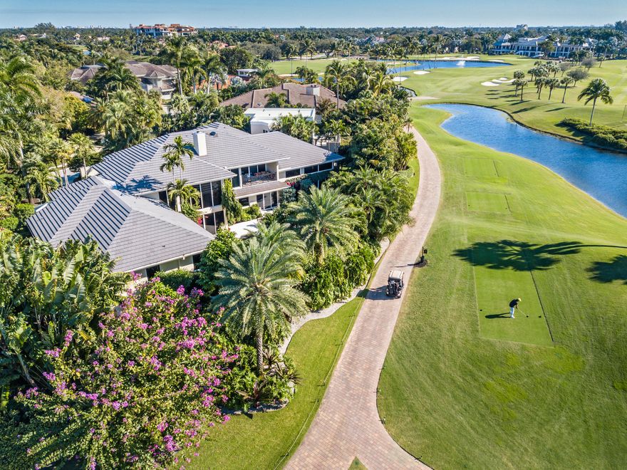One of the Finest Estates In Boca Raton Is now available! Located on a Private Cul- De-Sac In the Exclusive Boca Grove Golf & Tennis Club.This stunning residence encompasses over 12,000 sq. ft. of Exquisite Architectural Detail & Design.The Lushly Landscaped .5473 Acre Lot has an impressive 243' of direct Golf Course & Lake Views.This 5 Bedroom, 7 Bath & 3 Half Bath Residence features Large Entertaining Spaces, Movie Theatre, Study, Game Room, 2 Separate Kitchens, a Ground Floor 
In-Law/Staff Suite complete with Kitchenette.
Soaring Walls & Doors of Impact Glass. Resort Style Backyard Boasts 2 Covered Dining Areas, a Summer Kitchen, Separate Gas BBQ Grilling Station, Multiple Seating Areas for lounging around  Gorgeous Heated Pool with Waterfall. Walk To Worship.
Come See & Fall In Love For quicker access to 360 tour link please copy this link:
http://bit.ly/Rosedown360
More Highlights & Features Include: 
*A Travertine Marble Paver Circular Driveway
*All Terraces Finished with Ashlar Pattern Marble 
*Mature Lush Landscaping by noted Landscape Architect
*All High End Appliances including Subzero, Miele, Wolf
*Custom Inlaid Marble and Walnut Flooring as well as Wool Carpets throughout 
*Wall finishes include Venetian Plaster, Upholstered Walls & Designer Wall Coverings   
*A 3 Car Air-Conditioned Garage
*An In-Ground 500 Propane Tank powers the Kitchen's Wolf Cooktop, Outdoor Wok/Lobster Pot and BBQ Grill as well as the Jandy Pool Heater 
*8 Zones of Bryant Evolution Air-Conditioning
*Savant Smart Home Automation with Lutron Lighting Controls
*16 Zones of Distributed Audio
*A Closed Circuit Security Camera System
*A Panasonic Phone System
*Central Alarm Monitored Security System with Cellular Backup
*Main House completely Renovated in 2010 - Roof Replaced and Impact Glass installed at that time
*Guest Wing Addition completed in 2013