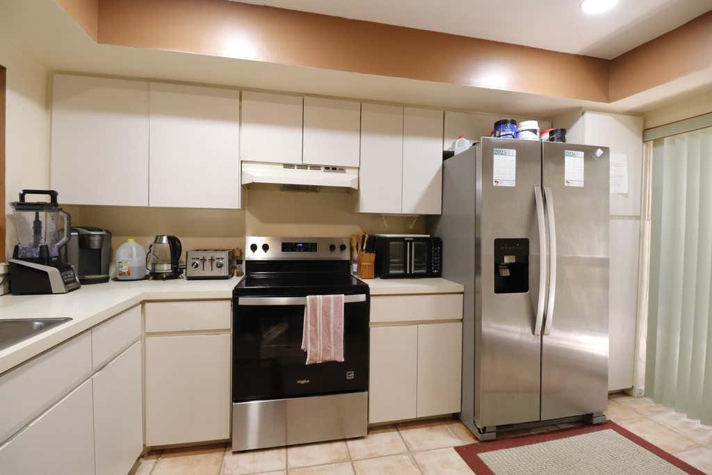 Photo of 9460 Meadowood Drive #202, Fort Pierce, FL 34951 (MLS # B26059021)