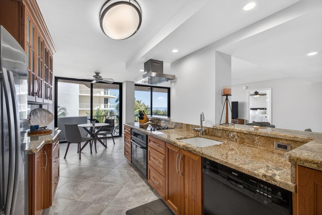 Photo of 4200 N Ocean Drive #1-406, Riviera Beach, FL 33404 (MLS # B26064245)