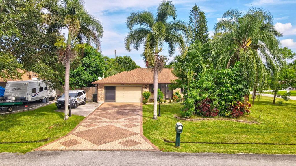 Photo of 501 NW Colonial Street, Port Saint Lucie, FL 34983 (MLS # R11110992)
