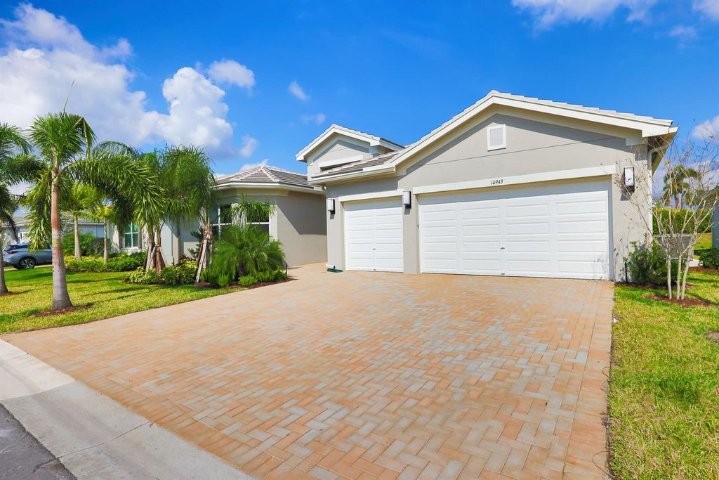 Photo of 10943 SW Ivory Springs Lane, Port St Lucie, FL 34987 (MLS # R10867055)