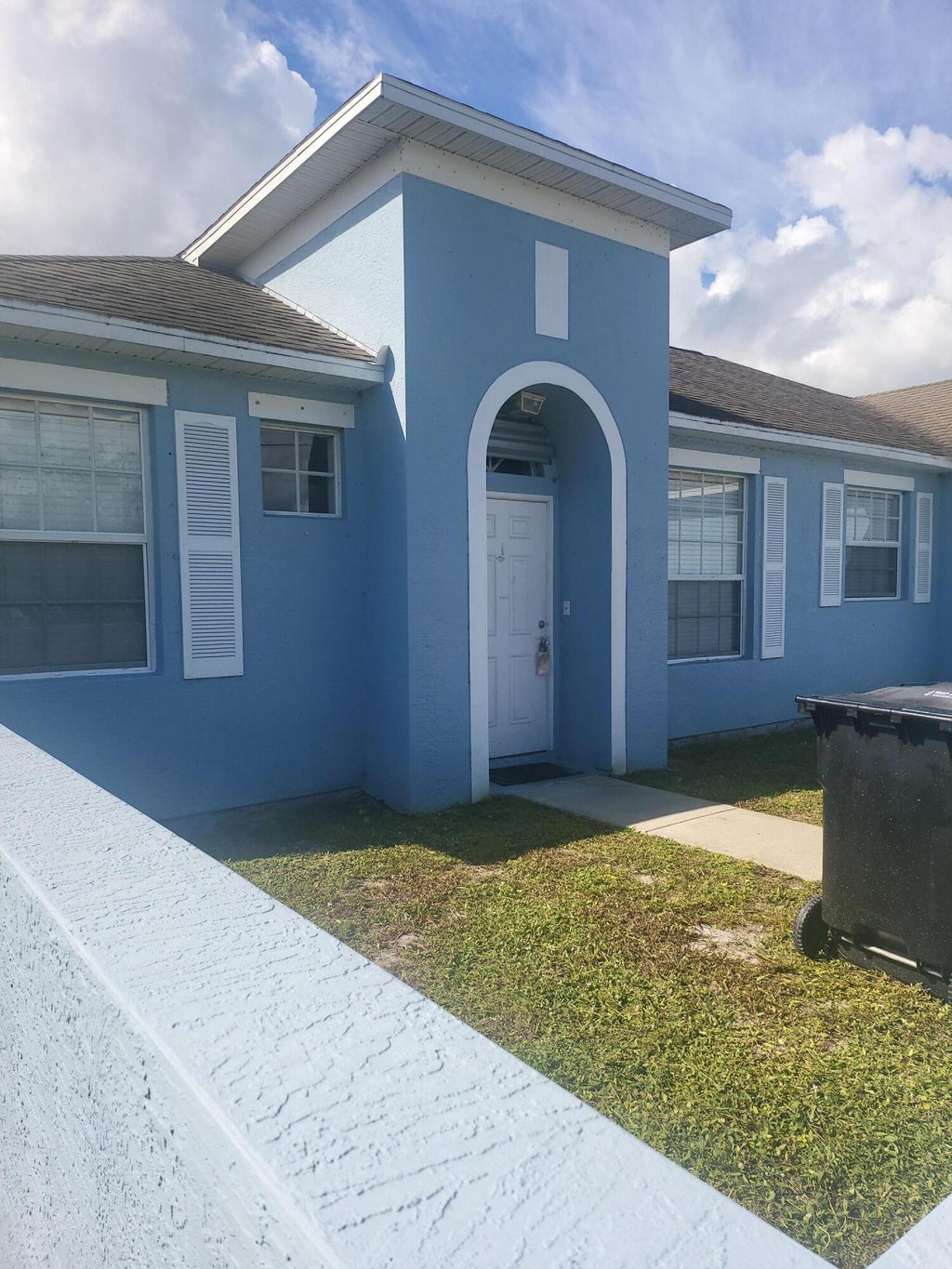 Photo of 558 SW Halifax Avenue, Port Saint Lucie, FL 34953 (MLS # B26079819)