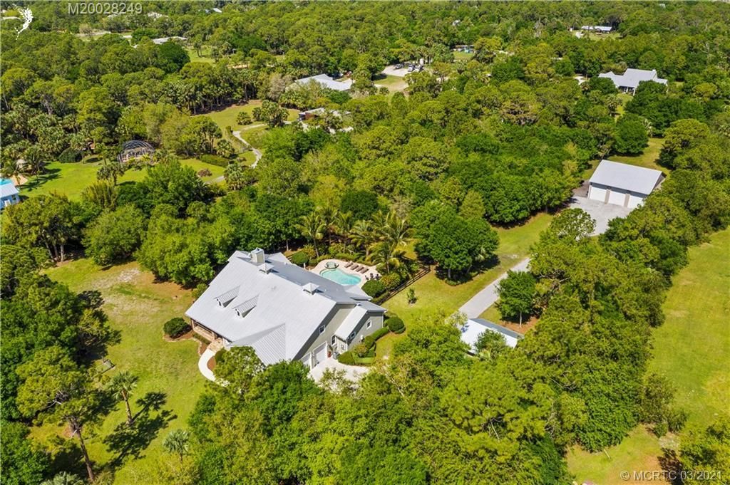 Photo of 5905 SW Ranchito Street, Palm City, FL 34990 (MLS # R10698959)