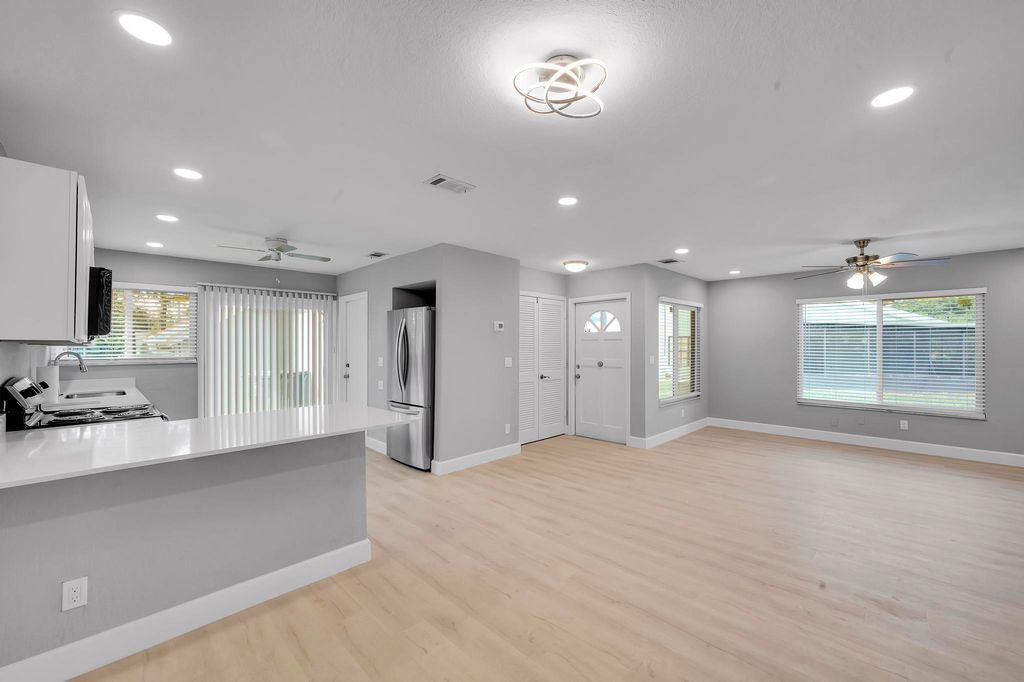 Photo of 1461 SE Rivergreen Circle, Port Saint Lucie, FL 34952 (MLS # R10974825)