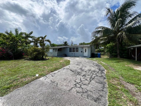 Photo of 5671 NE 8TH Avenue, Oakland Park, FL 33334 (MLS # B26076149)