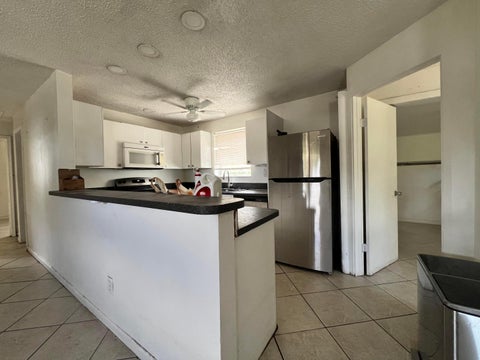 Tiny photo for 5671 NE 8TH Avenue, Oakland Park, FL 33334 (MLS # B26076149)