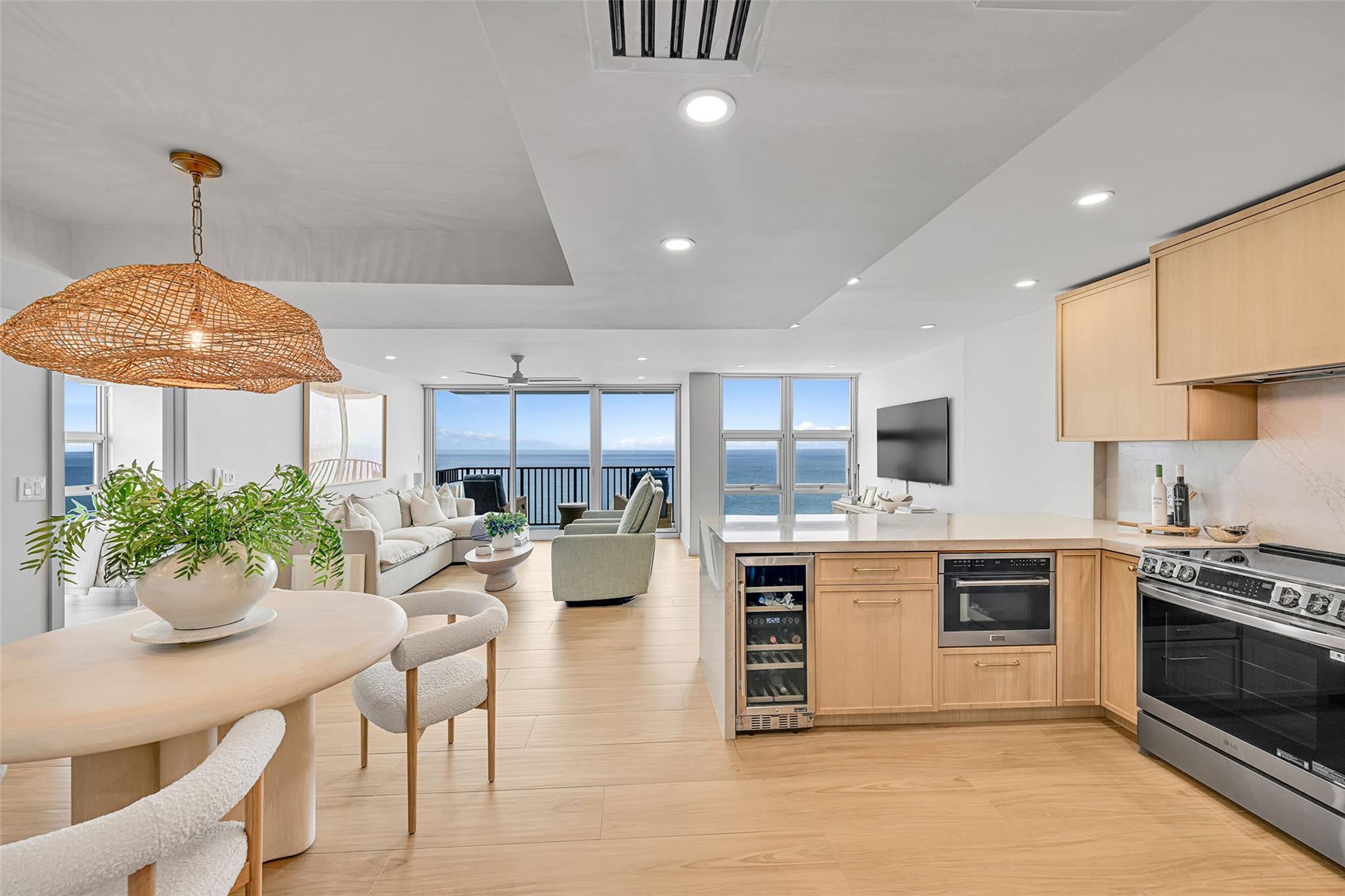Spend your winter at the beach in this fully renovated corner unit with breathtaking direct ocean views. The open kitchen features quartzite counters, stainless appliances, and a wine refrigerator. The primary suite offers a king-size bed, while the guest room has two sets of full bunk beds. Enjoy two balconies, floor-to-ceiling impact windows, and ocean views from every room, plus two walk-in closets. Resort-style amenities include a gym, sauna, tennis, pickleball, bocce, BBQ area, and more. Ideally located in the heart of Pompano Beach, just steps to the sand, dining, and shopping—this home blends space, views, and lifestyle.