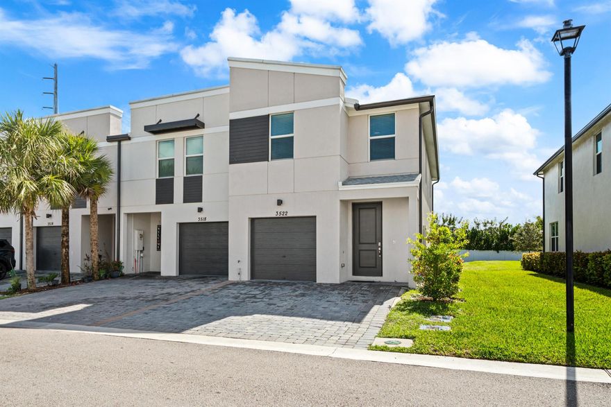 Brand-New Modern Townhome in the Heart of Palm Springs!Discover this stunning end-unit townhome offering 1,671 sq. ft. of stylish living space, featuring 3 bedrooms, 2.5 baths, and a 1-car garage. Enjoy a bright, open-concept floor plan with a spacious kitchen island, modern white shaker cabinetry, granite countertops, and sleek tile flooring complemented by soft neutral carpet upstairs, a flexible loft space and walk-in laundry room add convenience and functionality.Located in Fontana, an intimate community of just 59 townhomes, you're only 3 miles from Lake Worth Beach and close to shopping, dining, and entertainment. Built with impact windows and energy-efficient construction, this home combines comfort, durability, and savings. This home truly has it all!