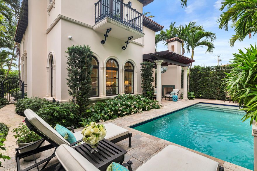 Mizner-inspired Spanish Revival home designed by Pat Segraves & ideally located in the heart of Palm Beach. This 4BR, 4.5BA home offers 3,067± sq ft of living space across 2 comfortable floors - serviced by both a staircase & an elevator. Architectural details include cast stone trim, high ceilings, Spanish LR fireplace, travertine floors, arched windows/doorways, & a main stair with hand-painted tile risers & a wrought-iron bannister. Daily living enhancements include a covered loggia, BBQ grill & heated pool which come together beautifully for the perfect indoor-outdoor experience. More details include: 2-car garage with lift & a generator. Beach & bike trail access conveniently located at the east & west ends of Seminole Avenue. Moments from a plethora of fun shops & delicious dining.