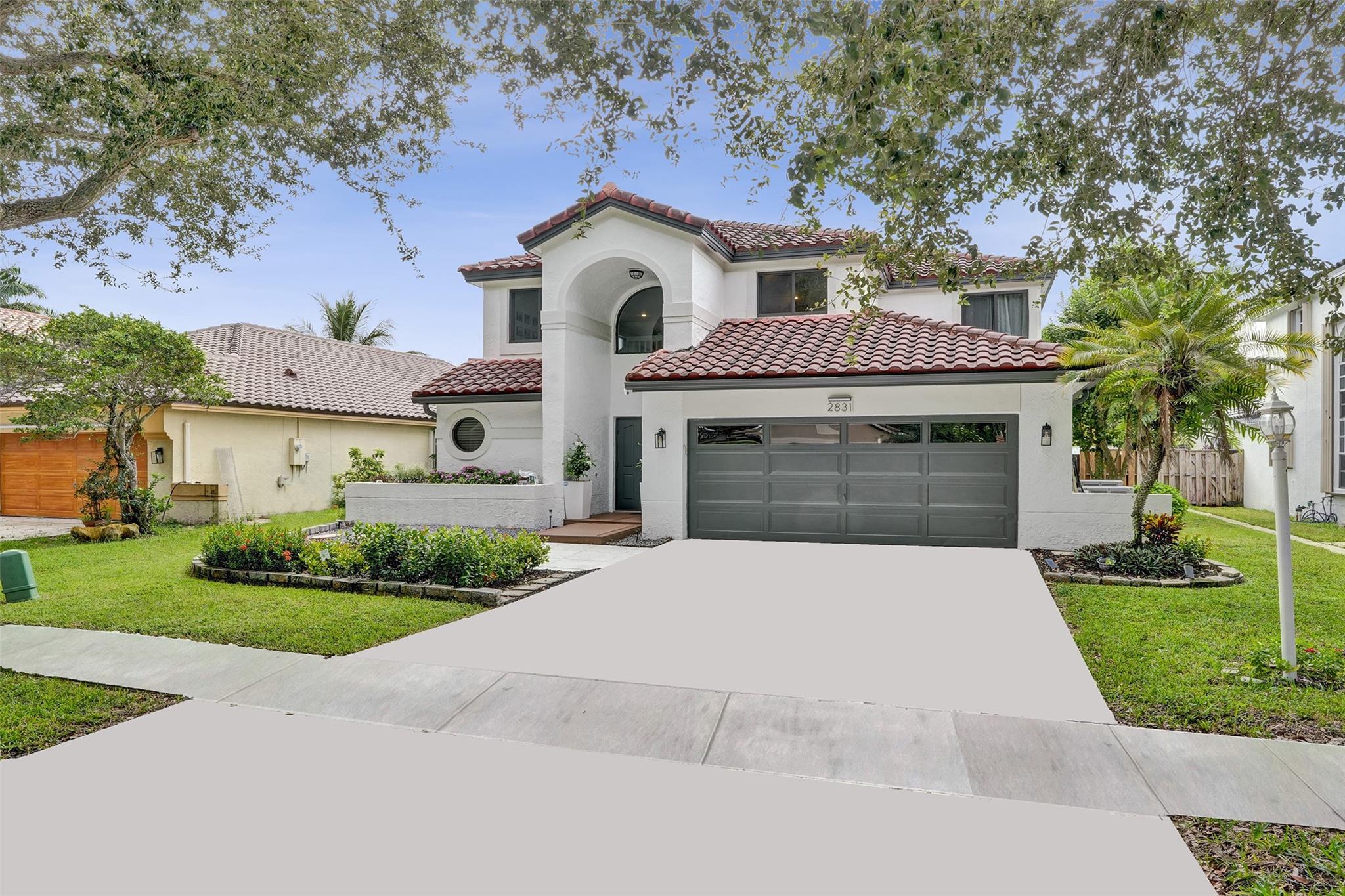 When you know, you know—and the instant you walk in, you’ll feel it. This 4-bed, 2.5-bath home in Cooper City’s guard-gated Embassy Lakes has been exquisitely updated with impact windows, a chef’s kitchen with new appliances and custom finishes, and spa-inspired bathrooms, including a tranquil first-floor master retreat. Soaring ceilings and walls of glass flood the interiors with natural light, while the home’s two A/C systems and a 10-year-young roof provide comfort and peace of mind. Outside, your private sanctuary awaits with a pool, a patio for effortless entertaining, and a petite putting green that makes every sunset feel like playtime. Paired with A-rated schools and resort-style amenities just beyond the gate, this is elegance, leisure, and longevity all in one—your forever home.
