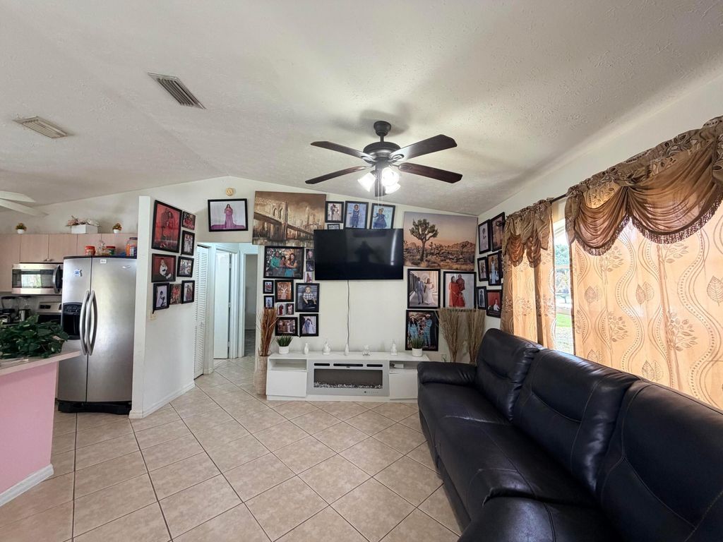 Photo of 1342 SW Wampler Avenue, Port Saint Lucie, FL 34953 (MLS # B26027250)