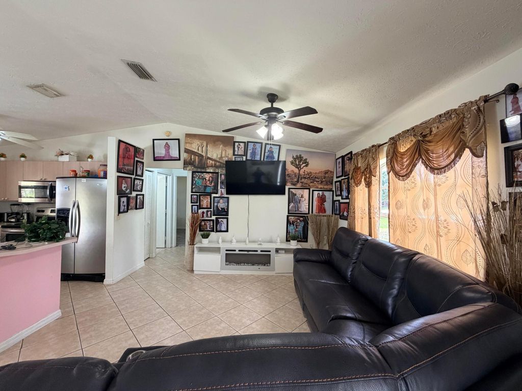 Photo of 1342 SW Wampler Avenue, Port Saint Lucie, FL 34953 (MLS # B26027250)